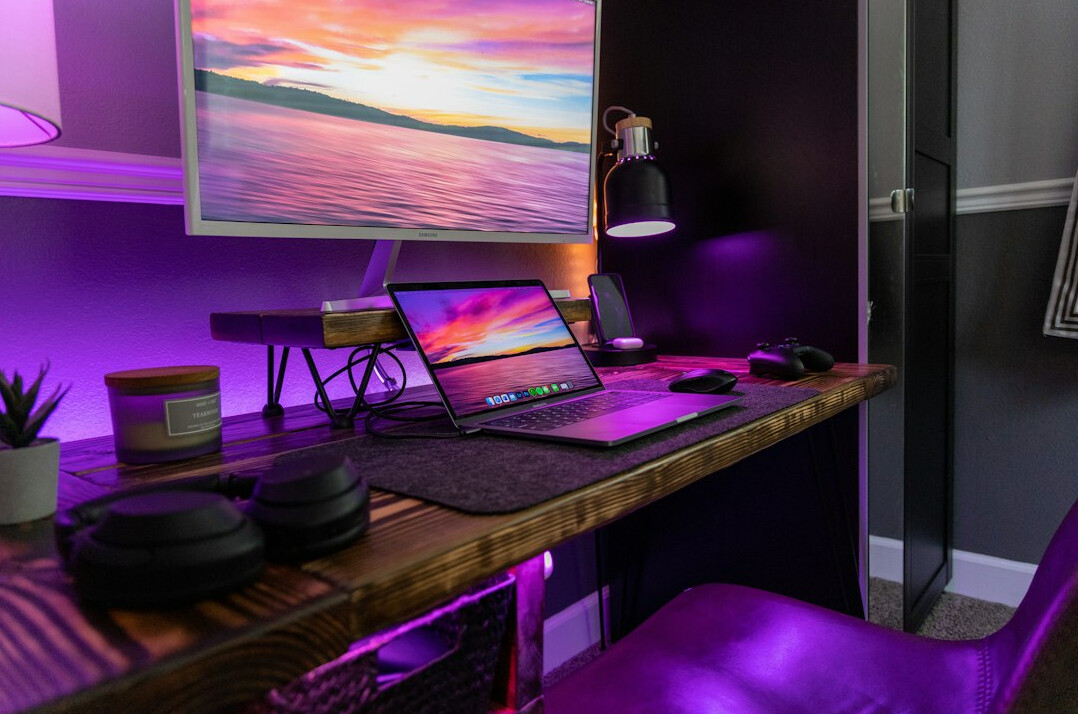 Video editing suite with multiple monitors showing timeline software